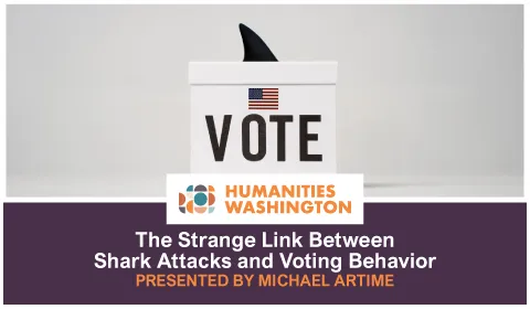 Vote box with shark fin sticking out with title of lecture