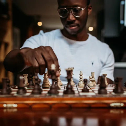 Man Playing Chess